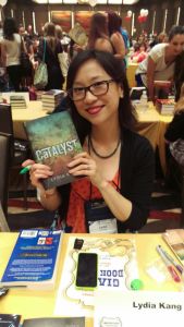 Lydia Kang, one of the authors Emily asked me to visit, was kind enough to sign Em's book and pose for a pic